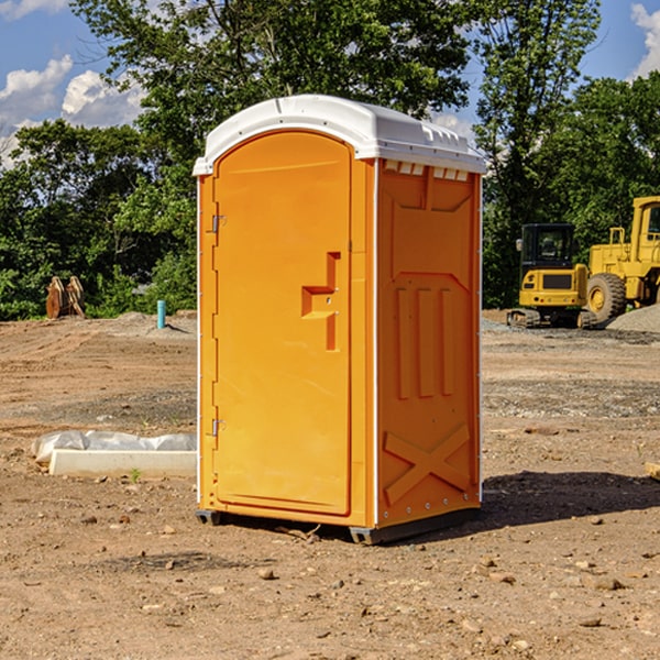 how often are the portable restrooms cleaned and serviced during a rental period in Holyrood KS